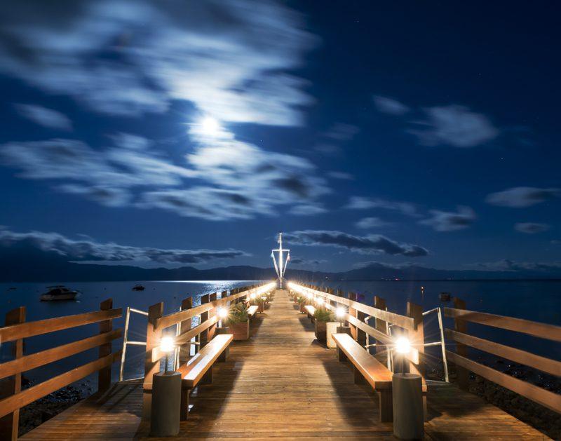 Illuminated Pier & Full Moon Sky