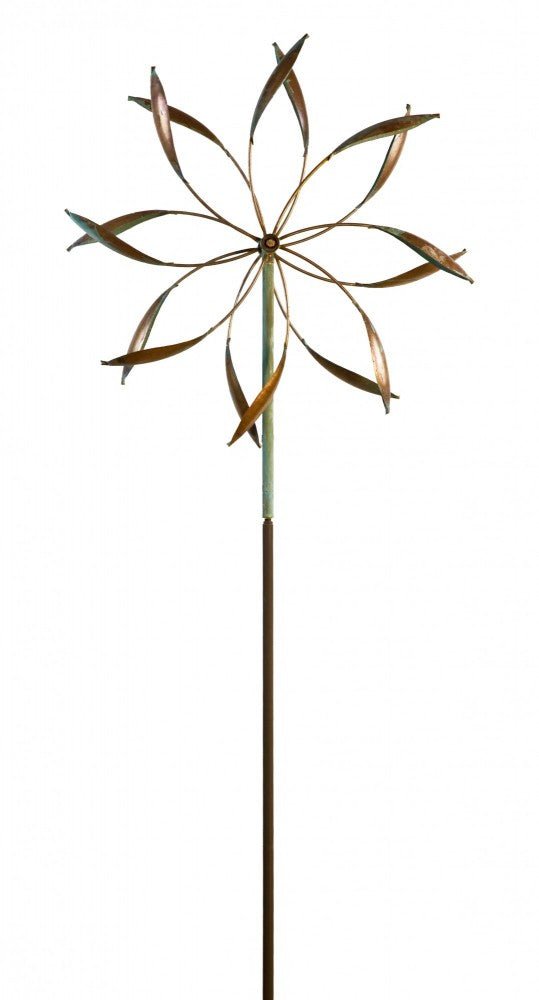 The Double Spinner is a metal wind ornament with starburst-like, leaf-shaped blades arranged in a circle on a long pole. Resembling Lyman Whitakers art, its earthy tones offer a rustic look, making it an ideal garden decoration amid the climate crisis.