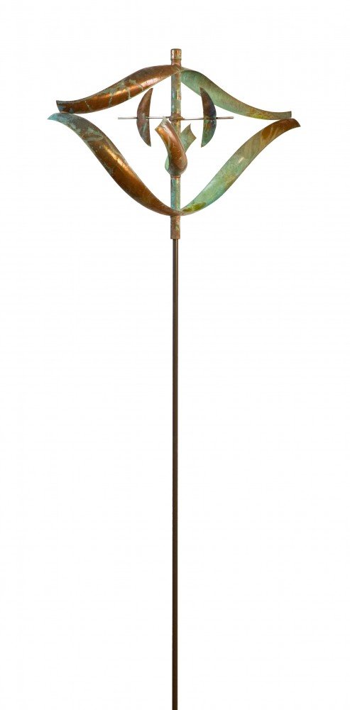 The Elements - Fire by Lyman Whitaker features tall, curved blades forming an eye shape with a coppery patina. Mounted on a vertical pole, it elegantly spins in the breeze, ideal for art galleries or open spaces against a white backdrop.
