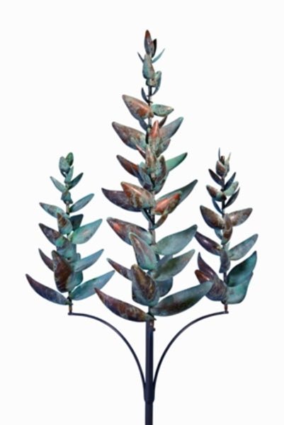 The Garden of Ginger wind spinner, echoing Lyman Whitakers art, boasts three vertical branches with rustic metal leaves in green and copper patina. Mounted on a dark stem, it is a perfect addition to any collection at the Marcus Ashley Gallery near Lake Tahoe.