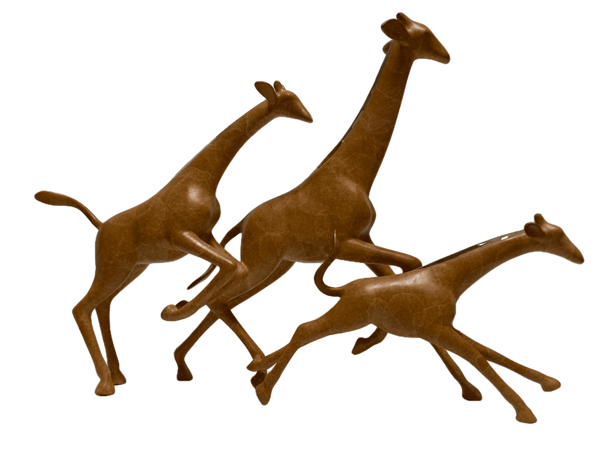 Three Giraffes - Running wooden carvings depict dynamic poses with elongated necks and slender legs, conveying movement. They are arranged closely on a white background.