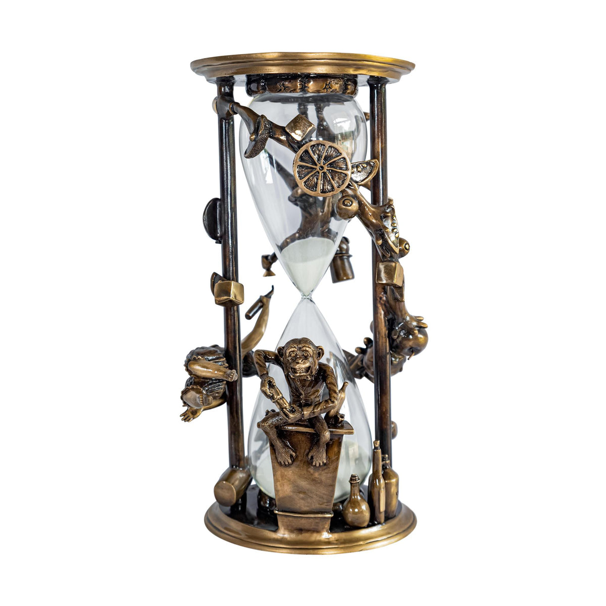 The Happy Hour (spinner included) is a decorative hourglass inspired by Paul Lotz, featuring intricate bronze detailing with a seated monkey among fruits and bottles around the central glass where sand visibly marks the passage of time.