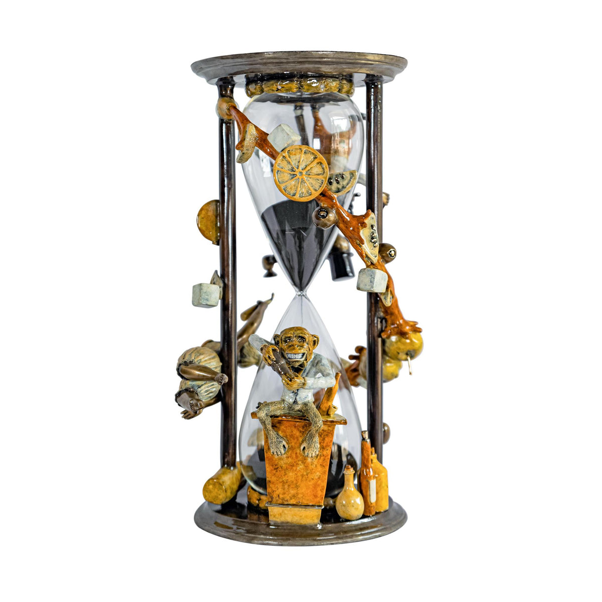 The Happy Hour by Paul Lotz, an ornate hourglass with a spinner, features intricate carvings including a skull, ships wheel, stars, and planets. It stands on a wooden base with dark sand flowing between glass chambers, symbolizing the passage of time.