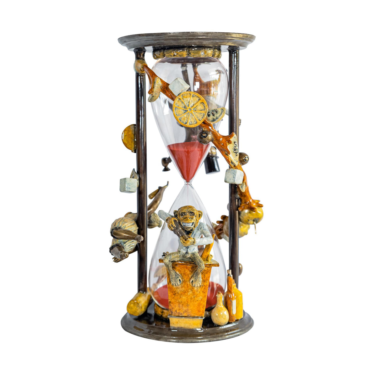 Paul Lotzs Happy Hour features an ornately decorated hourglass with red sand, a playful monkey figurine, and intricate details like a lemon slice. The exquisite frame resembles a delicate bronze sculpture, adding timeless elegance to any space. Includes spinner.