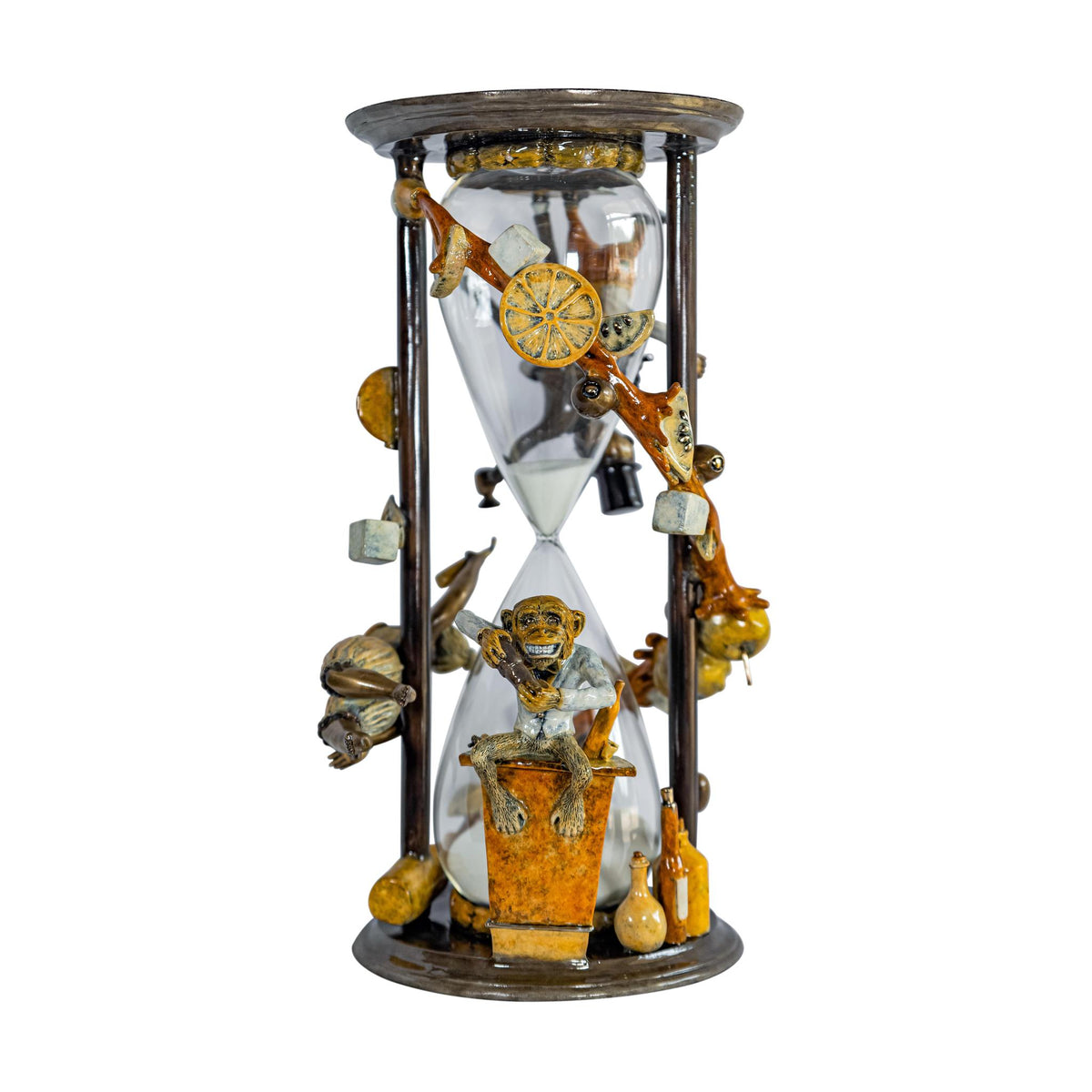 An ornate hourglass with intricate ceramic figures and whimsical elements, such as a monkey on a pot. This piece reflects Paul Lotzs Happy Hour style, featuring playful animal and tree designs around the glass. Includes spinner.