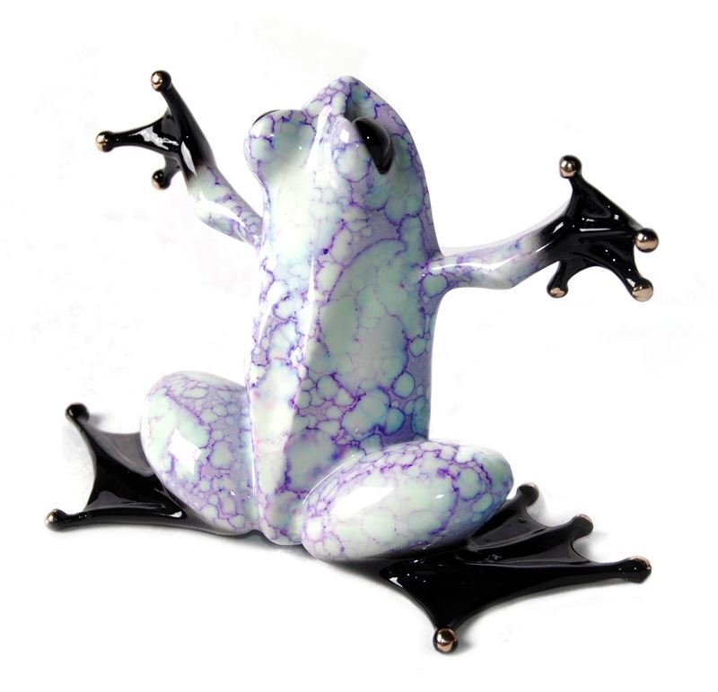 A ceramic frog sculpture named Hug, featuring a white and purple marbled design similar to Tim Cotterills Frogman. It sits with front legs raised, displaying black feet and legs. The glossy finish enhances its elegance.