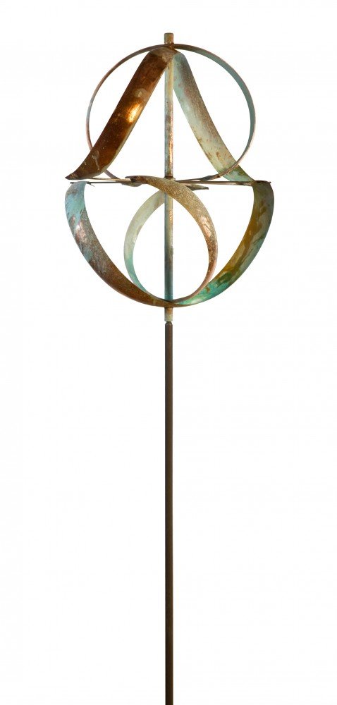 The Meridian sculpture is a tall, abstract metallic piece with interlocking curved shapes, resembling Lyman Whitakers wind sculptures. It features circular and triangular forms with a weathered patina finish, mounted on a slender vertical pole, akin to artworks at Marcus Ashley Gallery.