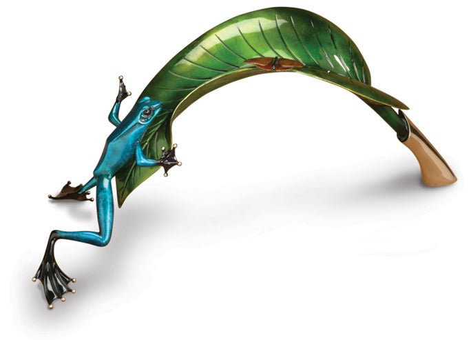 The bronze sculpture Over the Top, part of Frogman creations, depicts a vibrant blue frog with black feet scaling a large curved green leaf, featuring detailed veining and a dramatic bend that enhance the sense of motion as its limbs stretch in a daring climb.