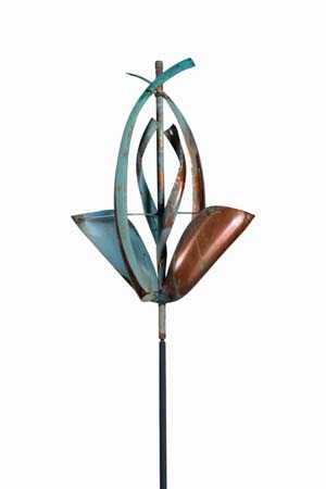 The sculpture titled Spring features tall, whimsical, curved elements in blue and brown reminiscent of a stylized flower. Reminiscent of Lyman Whitaker art, it mounts on a slender rod against a white background, creating an organic and enchanting form.