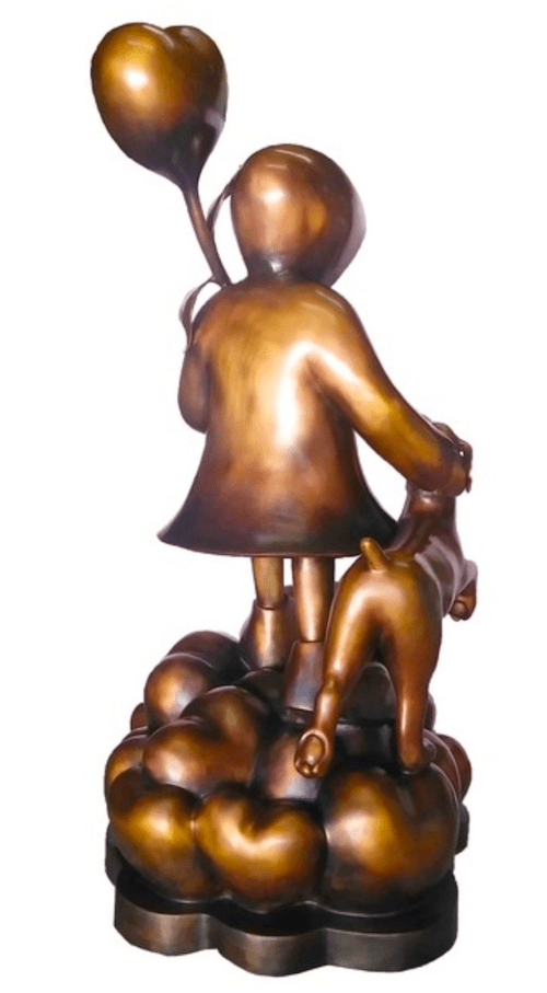 Mackenzie Thorpes limited edition bronze sculpture Stepping Stones depicts a child with a heart-shaped balloon standing on clustered hearts, alongside a small dog. The figures face away, symbolizing movement and the essence of love and emotion.