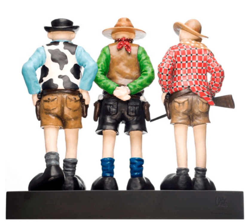 Three stylized figures in The Outlaw stand with their backs turned, wearing hats and traditional Bavarian attire featuring cow print, green, and red checkered shirts. One holds a rifle with hands clasped behind his back. This limited edition work reflects Mackenzie Thorpes unique style.