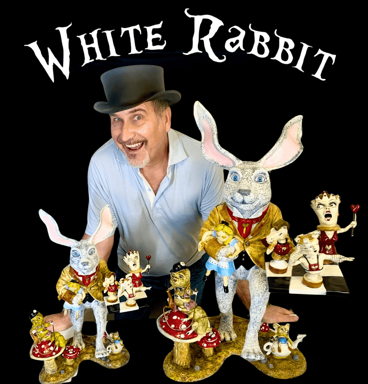 A man in a black top hat poses behind whimsical White Rabbit figurines with playful characters and mushrooms on a black background, featuring the product name “White Rabbit” above.