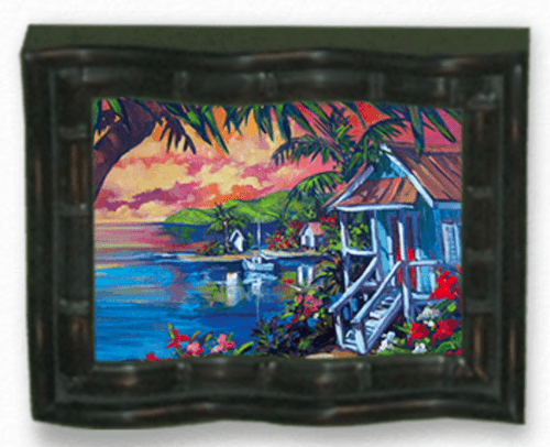The Low Key framed painting captures a tropical seaside sunset reminiscent of Steve Barton art, showcasing vibrant colors with a rustic house, lush greenery, palm trees, and flowers. A calm blue sea and distant green hills enhance the stunning coastal scenery beneath a colorful sky.