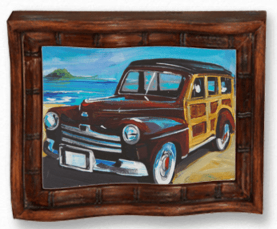 The limited edition Steve Barton Art piece, Mint Condition, captures a vintage car on a sandy beach with ocean waves and an island beyond. Elegantly enclosed in a carved wooden frame, it is available at Marcus Ashley Gallery.