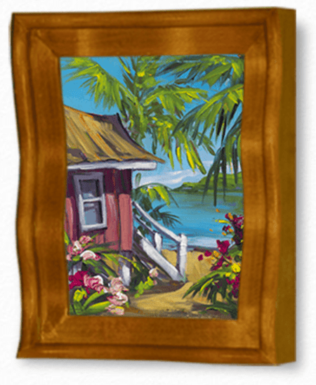 The Rainbow Cottage by Steve Barton, available at Marcus Ashley Gallery, is a framed tropical painting featuring a wooden house, lush flowers, and palm trees overlooking a vibrant blue sea under a clear sky. The frame is warm light brown.