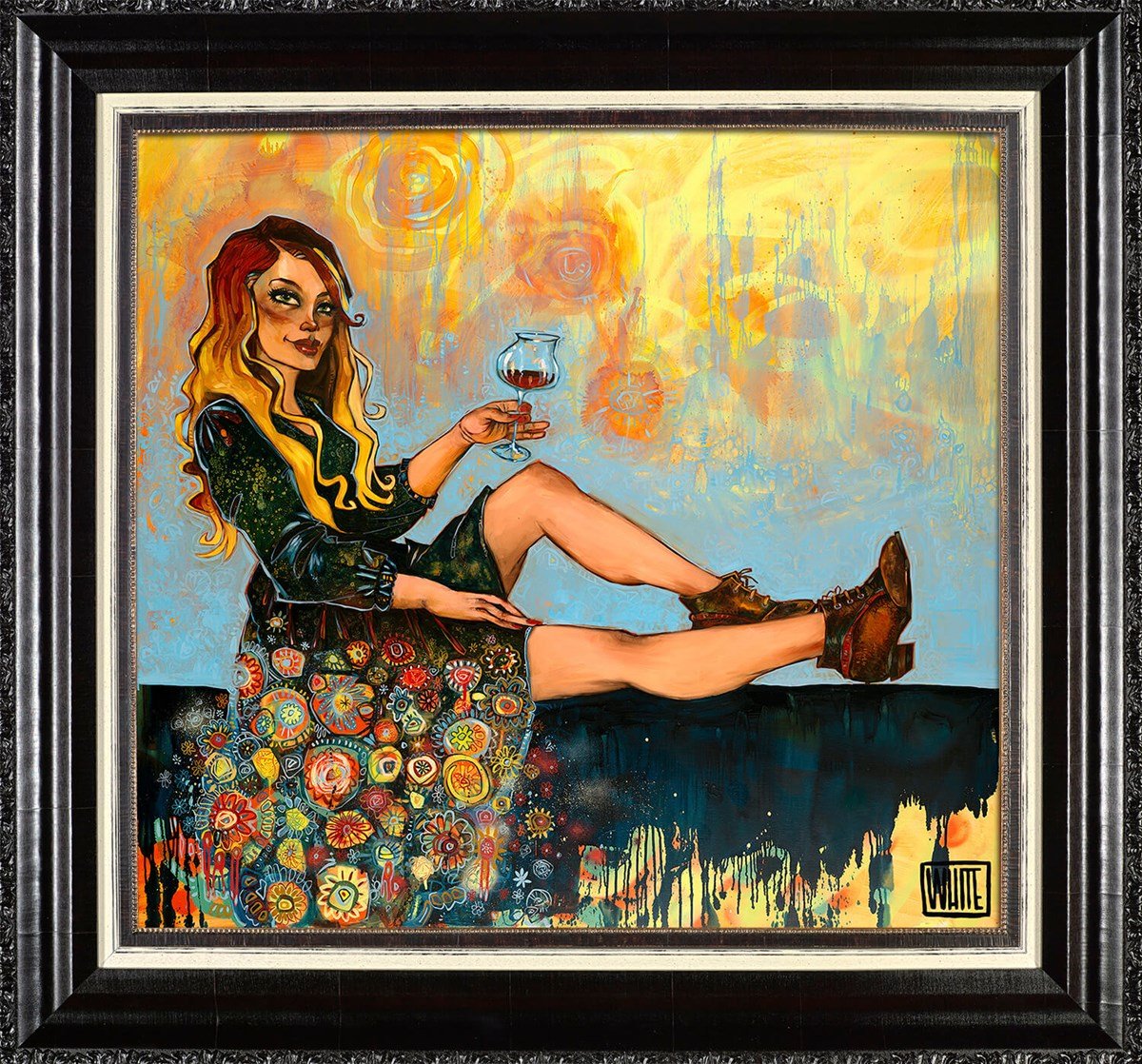This painting, titled Boots Like These, reminiscent of Todd White art, depicts a woman with long hair sitting cross-legged, holding a glass of wine. She wears a patterned dress and boots against an abstract orange and blue backdrop, elegantly framed with a thick black border.