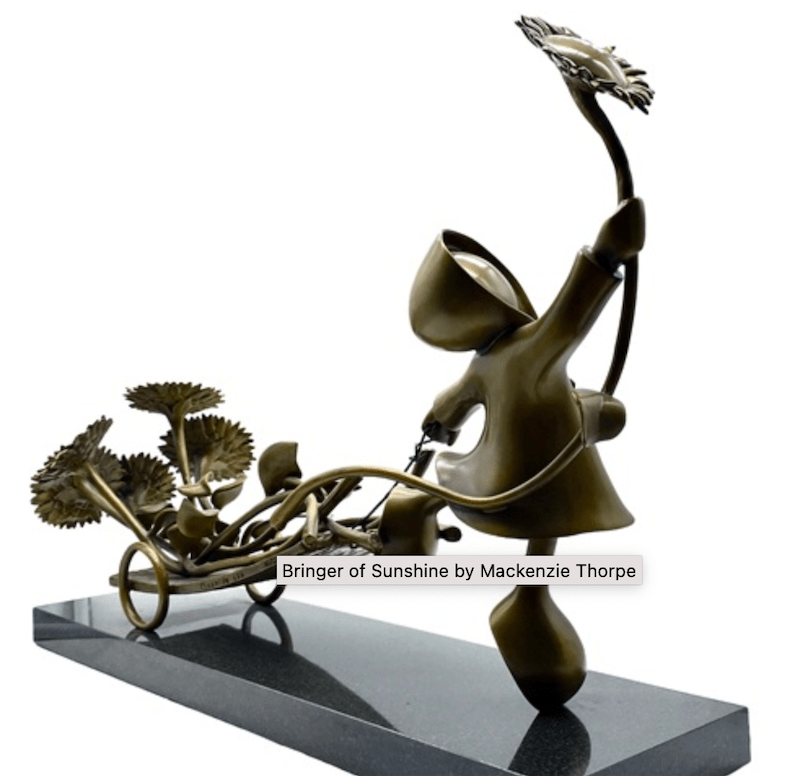The Bringer of Sunshine-Bronze by Mackenzie Thorpe is a limited edition sculpture showing a joyful figure with a sunflower, tricycle, and basket. Mounted on a dark rectangular base, it is available for sale.