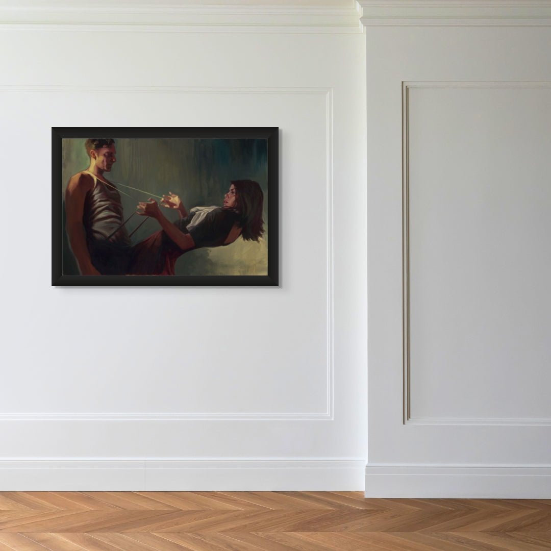 A minimalist room with light walls and wooden floors showcases Gabe Leonards Come With Me, a painting of a man in a tank top holding a woman playfully. This serene artwork enriches the space, capturing human connection and enhancing its modern ambiance.
