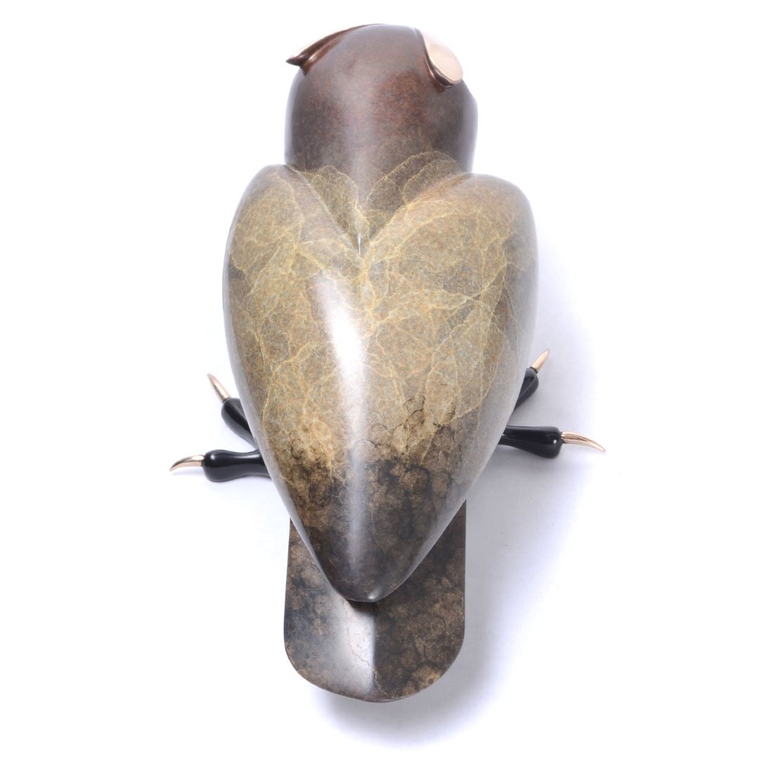 The sculpture Hamilton features an abstract stone owl with a polished, earthy-toned surface. Intricate textures and contrasting colors highlight its beak and feet, showcasing Tim Cotterills artistry.