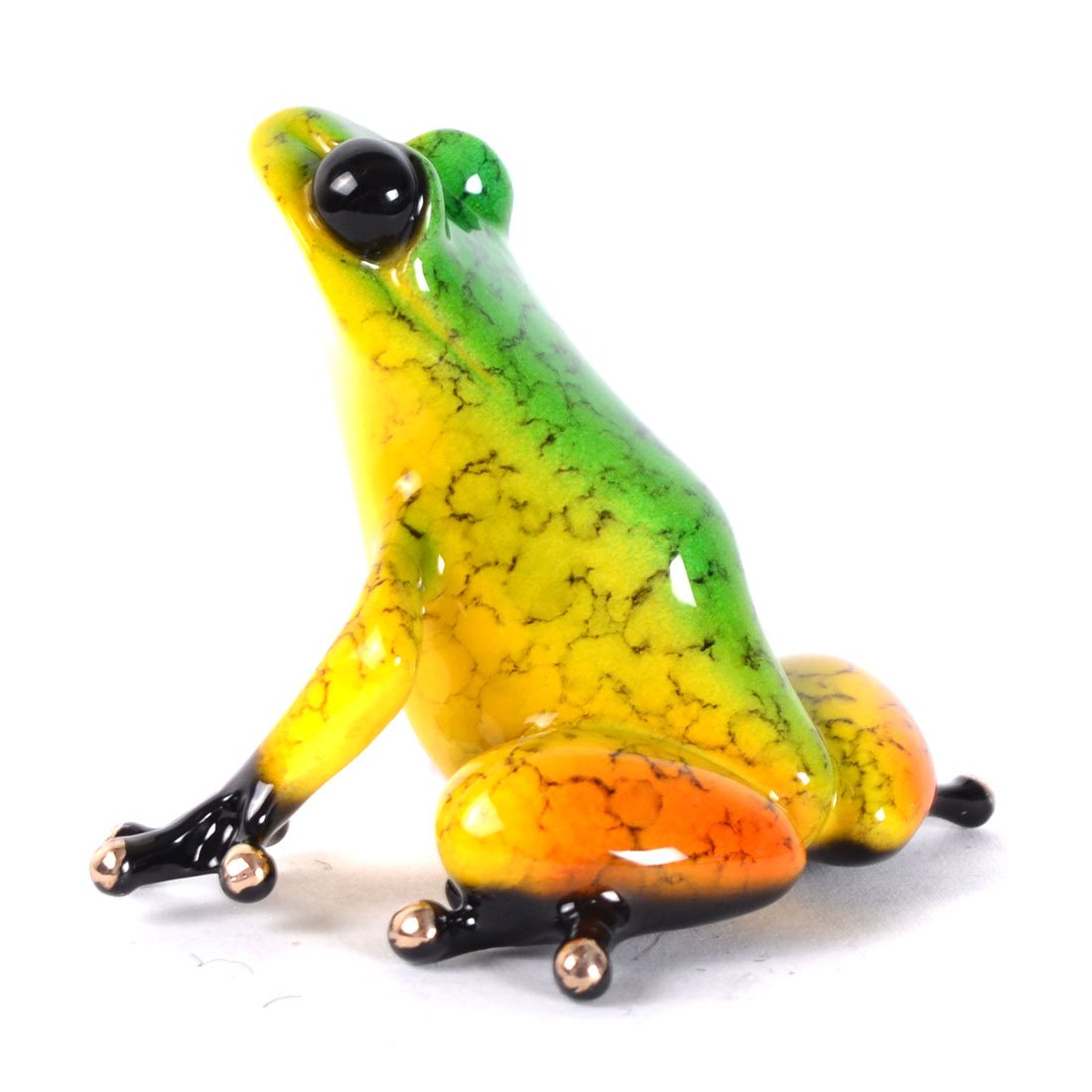 The exquisite Salsa glass figurine embodies Frogman art with a vibrant gradient of green, yellow, and orange. Inspired by Tim Cotterills iconic sculptures, it showcases black feet and large glossy black eyes that enhance its charming frog essence.