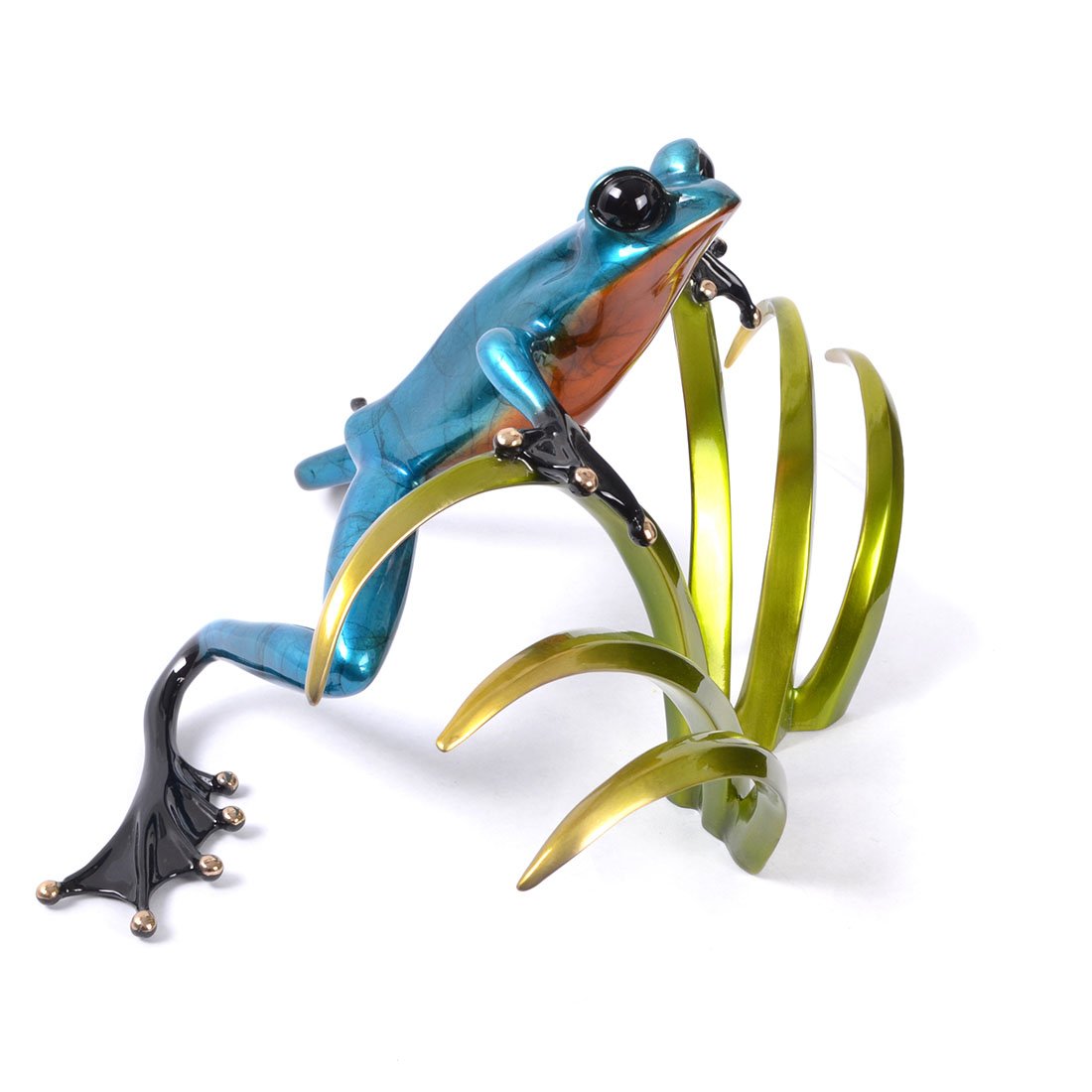 The colorful Sherlock art piece is a glossy blue and orange frog sculpture, captivating with its dynamic pose. Perched on stylized green leaves, it exemplifies the creativity in animal-inspired bronze sculptures.