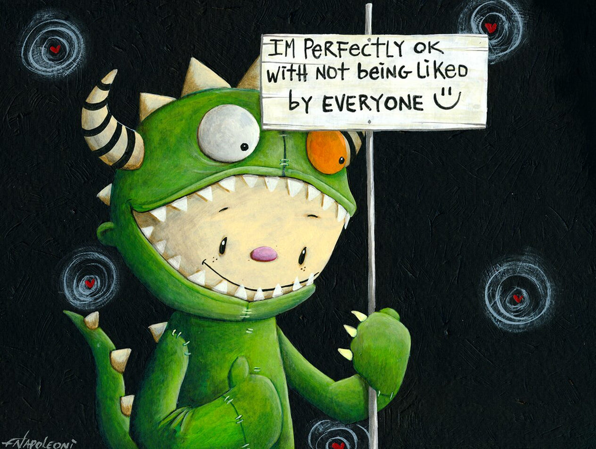 A cartoon child in a green monster costume, inspired by Fabio Napoleoni art, smiles holding a sign: I’M PERFECTLY OK WITH NOT BEING LIKED by EVERYONE :) amid red hearts—embracing self-love. Product: Letting Me Be Me.