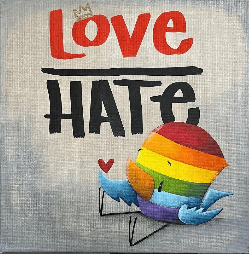 A vibrant bird with rainbow stripes and blue wings holds a red heart under Love in red with a crown and Hate, embodying Fabio Napoleonis message of Love Over Hate. The neutral background celebrates Pride Months spirit. Product: Love Over Hate.