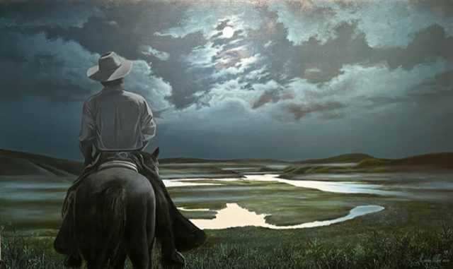 Midnight Cowboy portrays a cowboy on horseback viewing a moonlit landscape with a winding river and rolling hills beneath a cloudy night sky in this evocative oil on canvas.