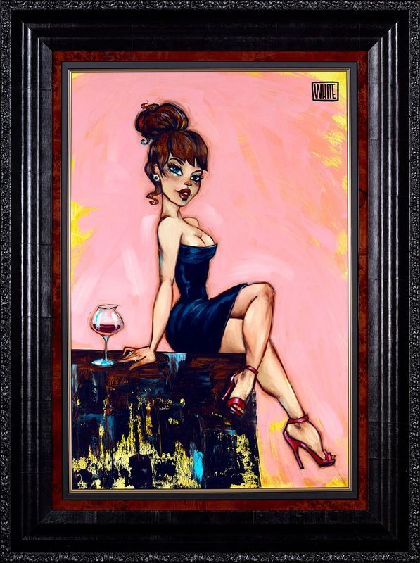 Nasty Habits, a giclée on canvas by Todd White, portrays a woman in a black strapless dress seated on a table against a pink background. Her elegant updo and red high heels are striking as she sits next to a glass of red wine. The piece is stylishly framed in black.