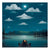A serene night scene titled Starry Starry Nights depicts two people on a wooden dock under a starry sky, misty lake, and bright moon. Surrounded by silhouetted trees, theyre illuminated by warm light reminiscent of Mackenzie Thorpes romantic charm with fluffy clouds enhancing the love in the air.
