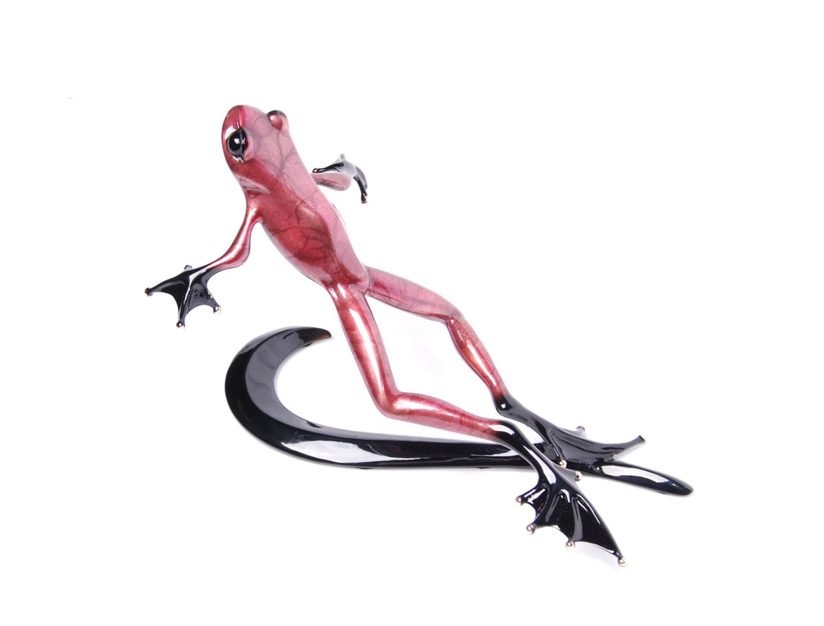The Valentino sculpture, featuring a red patina with a glossy deep pink body and black webbed feet, is gracefully posed against a white background, showcasing its shiny finish that highlights its sleek curves.